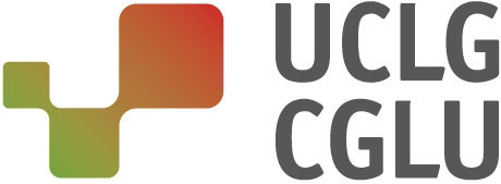 Grey text next to a green and orange square shape.